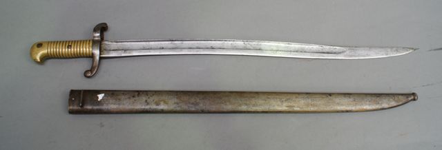 Appraisal: A French sword bayonet complete with scabbard