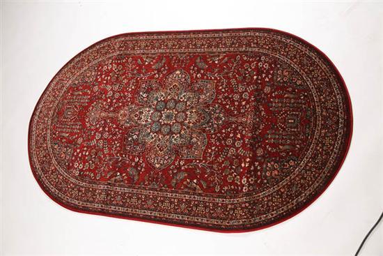 Appraisal: KASHIMAR Belgium th century Burgundy ground Oval ' x '