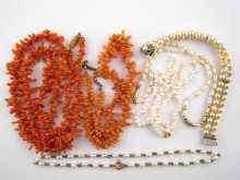 Appraisal: A mixed lot comprising two coral necklaces three freshwater pearl