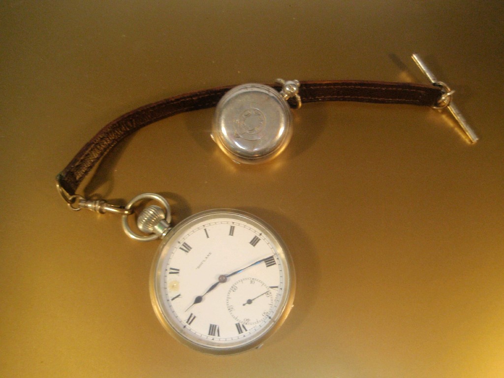 Appraisal: An open faced pocket watch together with a silver sovereign