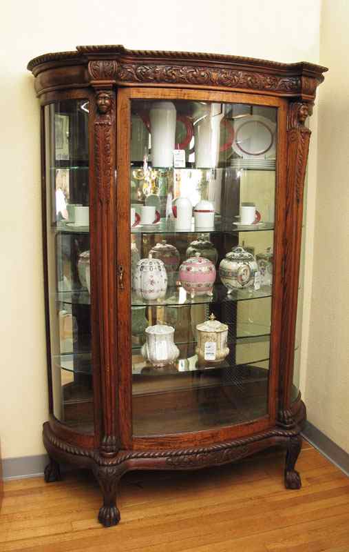 Appraisal: CARVED OAK TRIPLE BOW FRONT CHINA CABINET Late Victorian carved