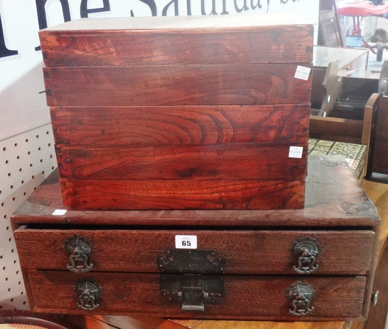 Appraisal: An Oriental hardwood two drawer box and a five tier