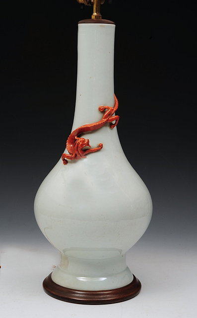 Appraisal: A CHINESE WHITE GLAZED PORCELAIN BOTTLE VASE of inverted baluster