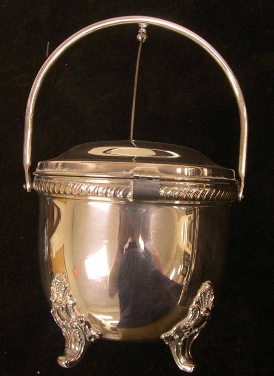 Appraisal: Dole Silver Co silverplate ice bucket on scrolled feet handle