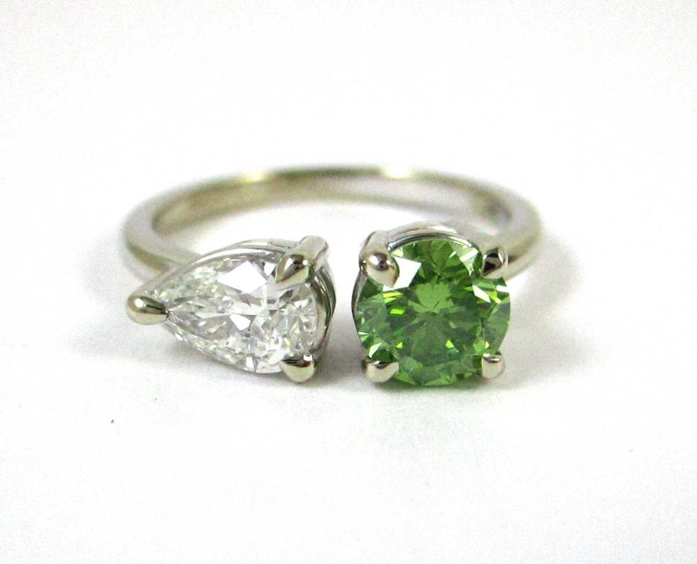 Appraisal: WHITE DIAMOND GREEN DIAMOND AND FOURTEEN KARAT WHITE GOLD RING