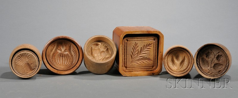 Appraisal: Six Two-Part Wooden Butter Molds America th century two depicting