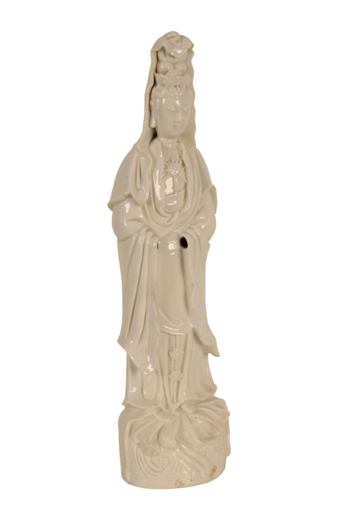 Appraisal: A DEHUA BLANC DE CHINE FIGURE OF GUANYIN standing on