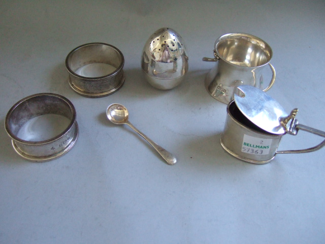 Appraisal: A silver twin handled egg cup of Arts Crafts design