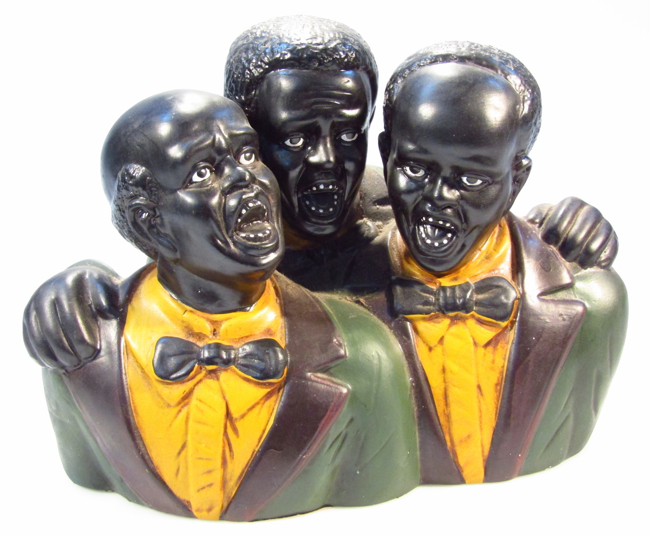 Appraisal: A thC bisque pottery figure group of a singing trio