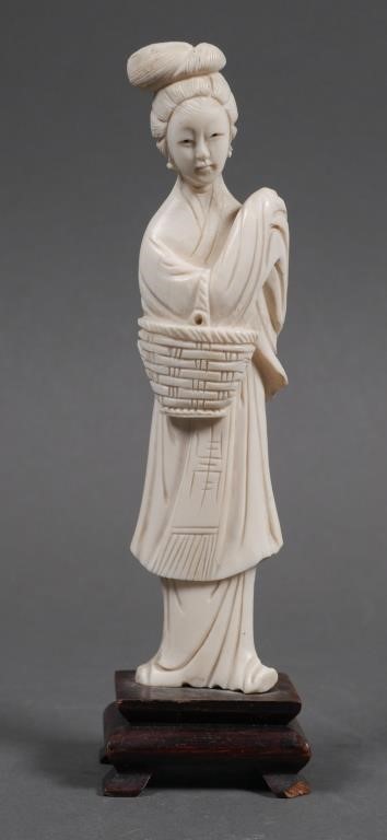 Appraisal: Finely carved Chinese ivory statue of a woman with a