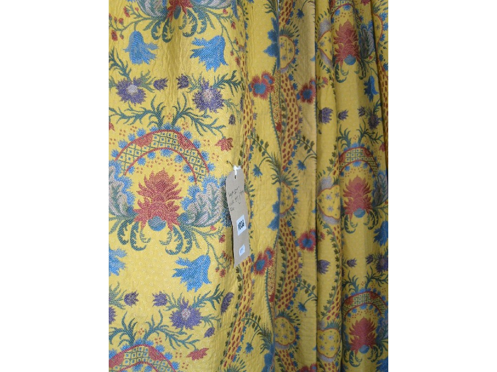 Appraisal: A pair of good quality yellow ground curtains with stylised