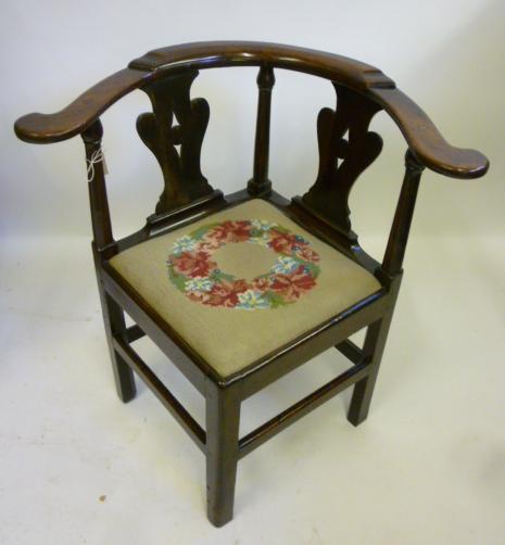 Appraisal: A GEORGE III FRUITWOOD CORNER CHAIR th century the scrolled