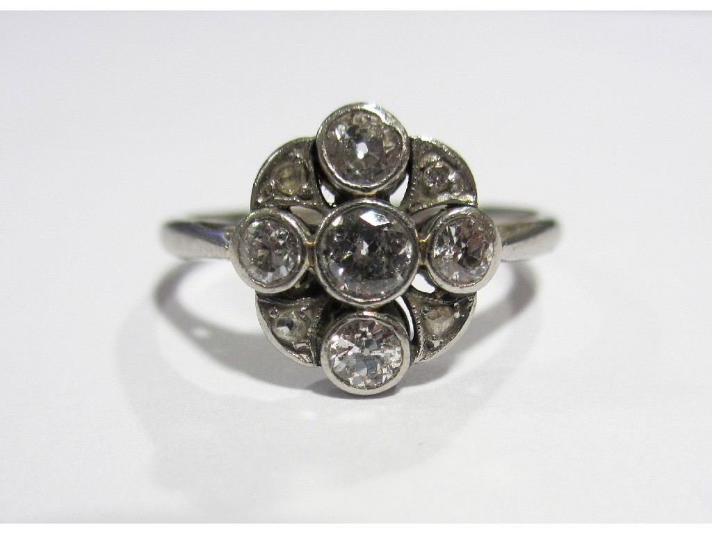 Appraisal: An Art Deco platinum and diamond ring the four larger