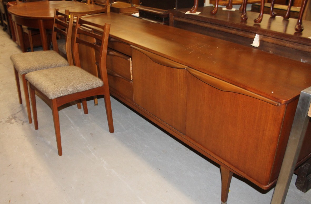 Appraisal: A 's teak Stonehill furniture sideboard set with various cupboards