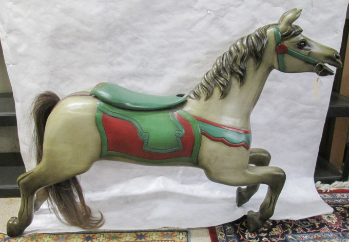 Appraisal: CARVED AND PAINTED CAROUSEL HORSE an inside row jumper with