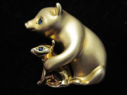 Appraisal: karat yellow gold polar bear broochTwo bears each with single