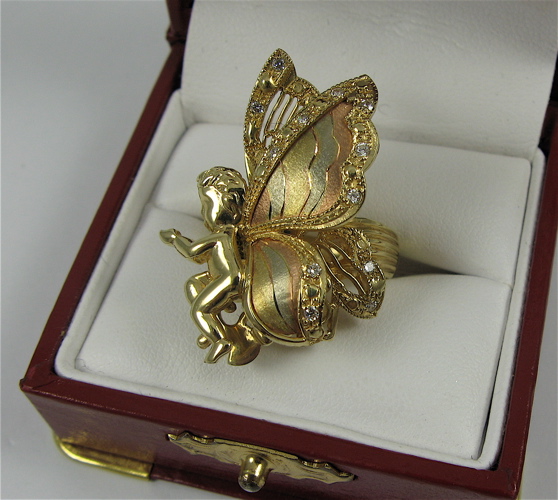 Appraisal: K YELLOW WHITE AND ROSE GOLD BUTTERFLY RING gross weight