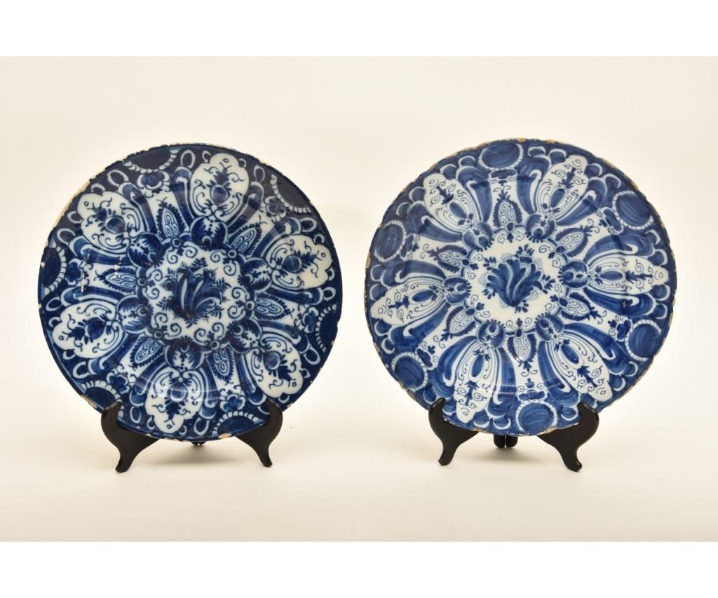 Appraisal: Two large deep Delft chargers th c dia each Condition