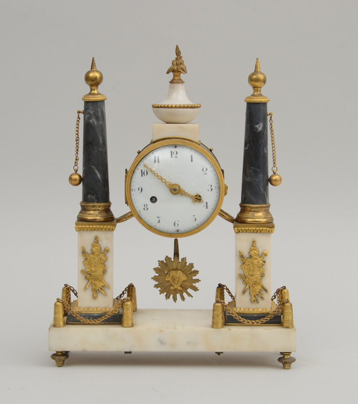 Appraisal: LOUIS XVI STYLE ORMOLU-MOUNTED MARBLE PILLAR MANTEL CLOCK The in