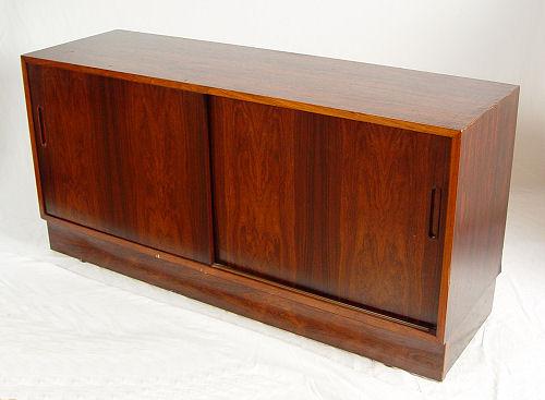 Appraisal: DANISH MODERN ROSEWOOD CREDENZA Double sliding doors The interior with