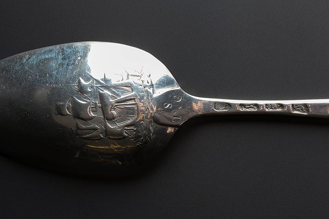 Appraisal: A SILVER MARROW SPOON with a picture back of galleon