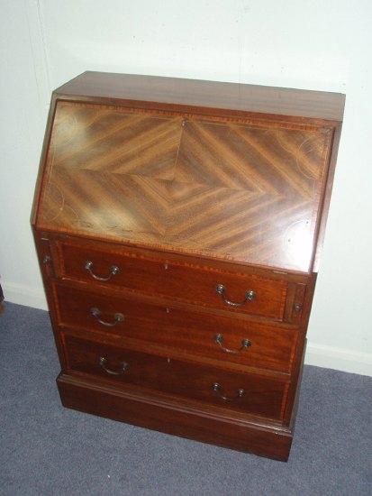 Appraisal: An early th Century satinwood and crossbanded bureau the fall