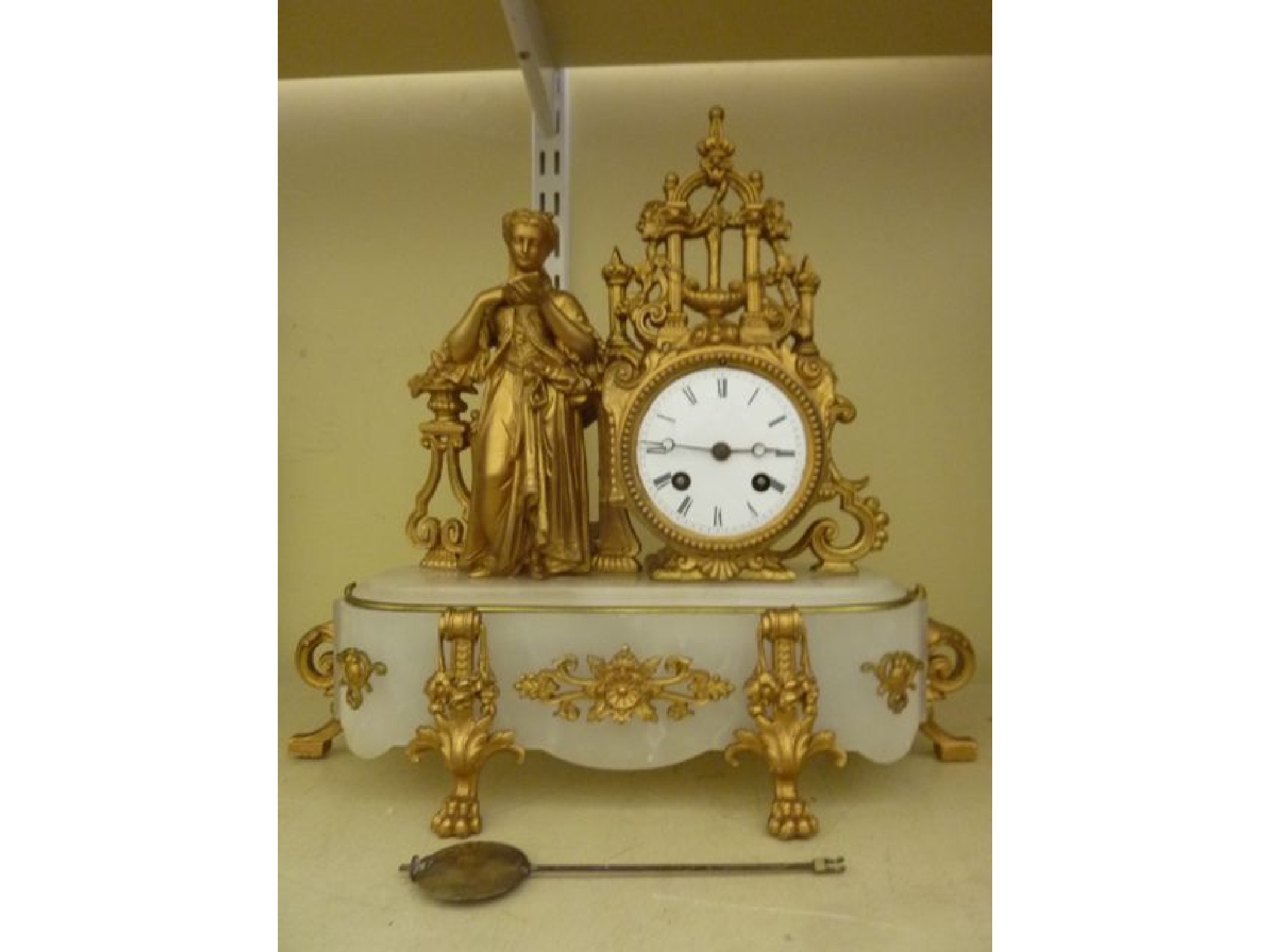 Appraisal: A small th century classical mantle clock with alabaster plinth