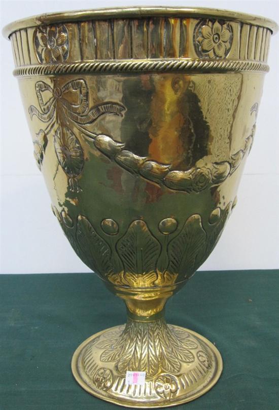 Appraisal: A BRASS REPOUSSE FOOTED PLANTER A brass repousse footed planter