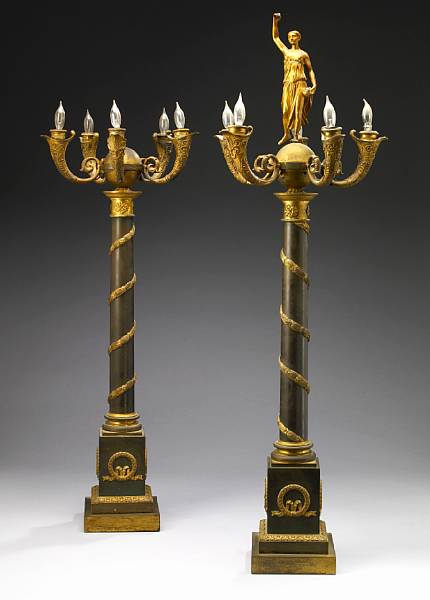 Appraisal: A pair of Empire style gilt and patinated bronze five