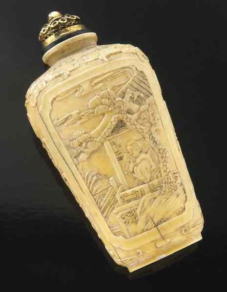 Appraisal: Chinese Qing carved ivory snuff bottle International buyers should note