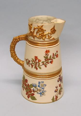 Appraisal: Registry No gilt bas relief flowers below rim handle side