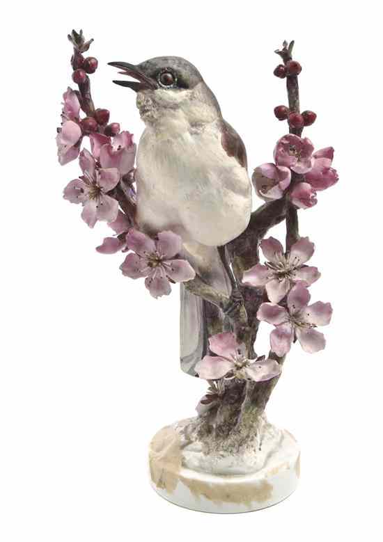 Appraisal: A Royal Worcester Dorothy Doughty Bird Mocking Bird perched on