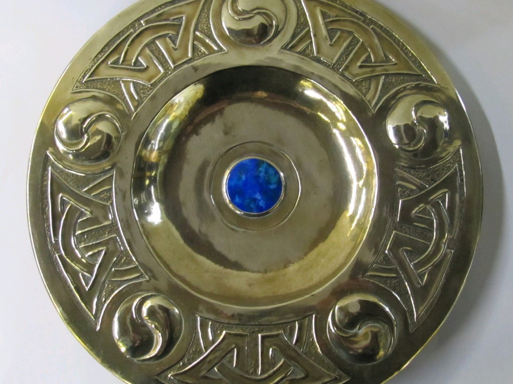 Appraisal: Arts and Crafts brass charger with Celtic knotwork decoration and