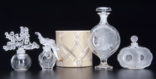 Appraisal: LALIQUE Four modern perfume bottles including L'Air du Temps with