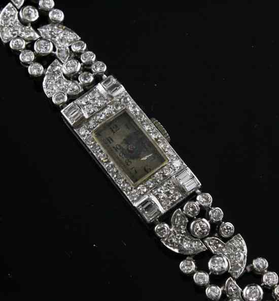 Appraisal: A 's diamond set platinum cocktail watch with rectangular dial