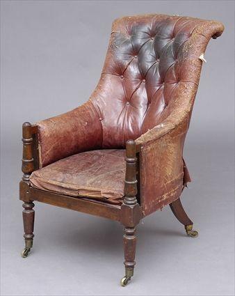 Appraisal: WILLIAM IV CARVED MAHOGANY LIBRARY ARMCHAIR The tufted leather back