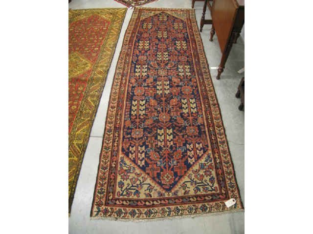 Appraisal: Malayer Persian Handmade Runner overall geometrics reds blues ivory '