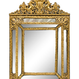 Appraisal: A Brass Embossed Venetian Style Mirror Early th Century height