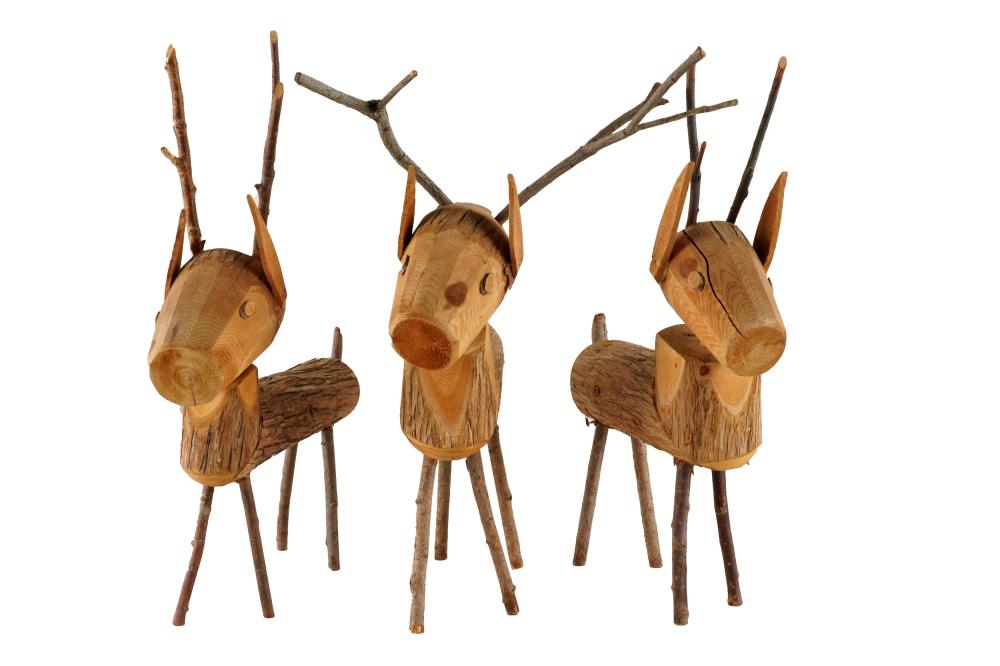 Appraisal: THREE AMERICAN FOLKART WOODEN REINDEER FIGUREScarved wood and twigs unsigned