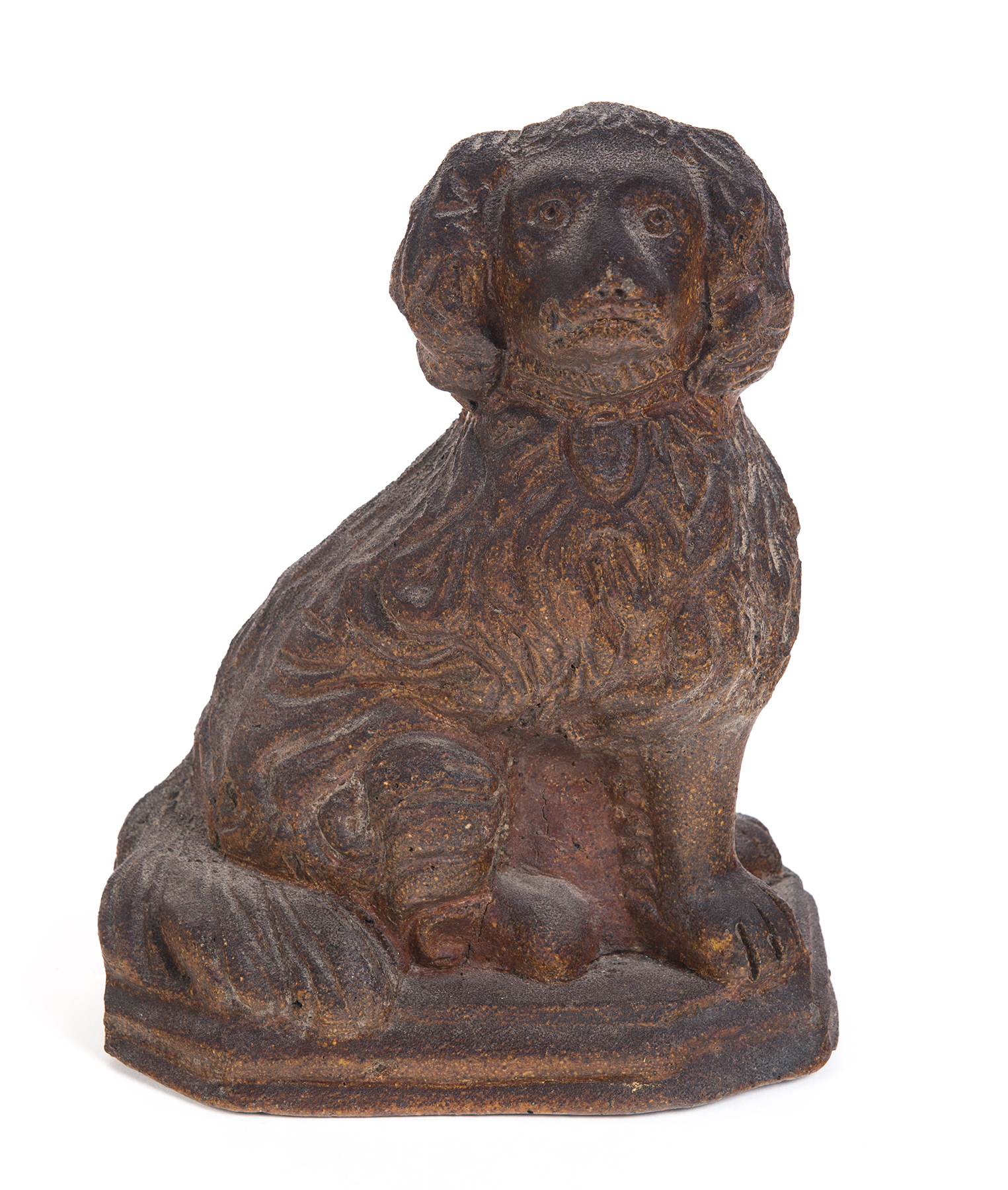 Appraisal: OHIO SEWERTILE DOG Late th-early th century Seated spaniel with