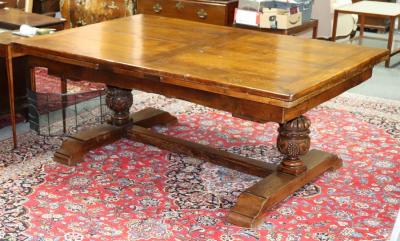 Appraisal: A large th Century style oak refectory table the draw