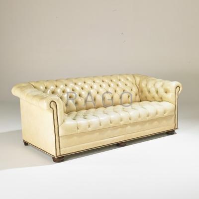 Appraisal: CHESTERFIELD Sofa USA s Distressed leather stained and lacquered oak