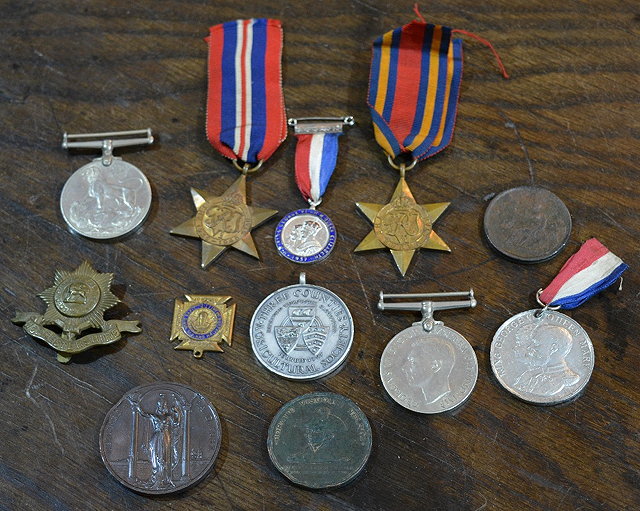 Appraisal: A group of World War II medalstogether with a bronze