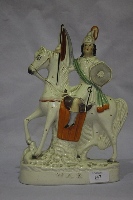 Appraisal: A STAFFORDSHIRE POTTERY EQUESTRIAN FIGURE 'War' cm high