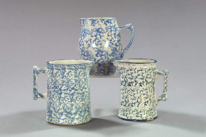 Appraisal: Collection of Three American Blue-Sponged White-Glazed Stoneware Pitchers third quarter