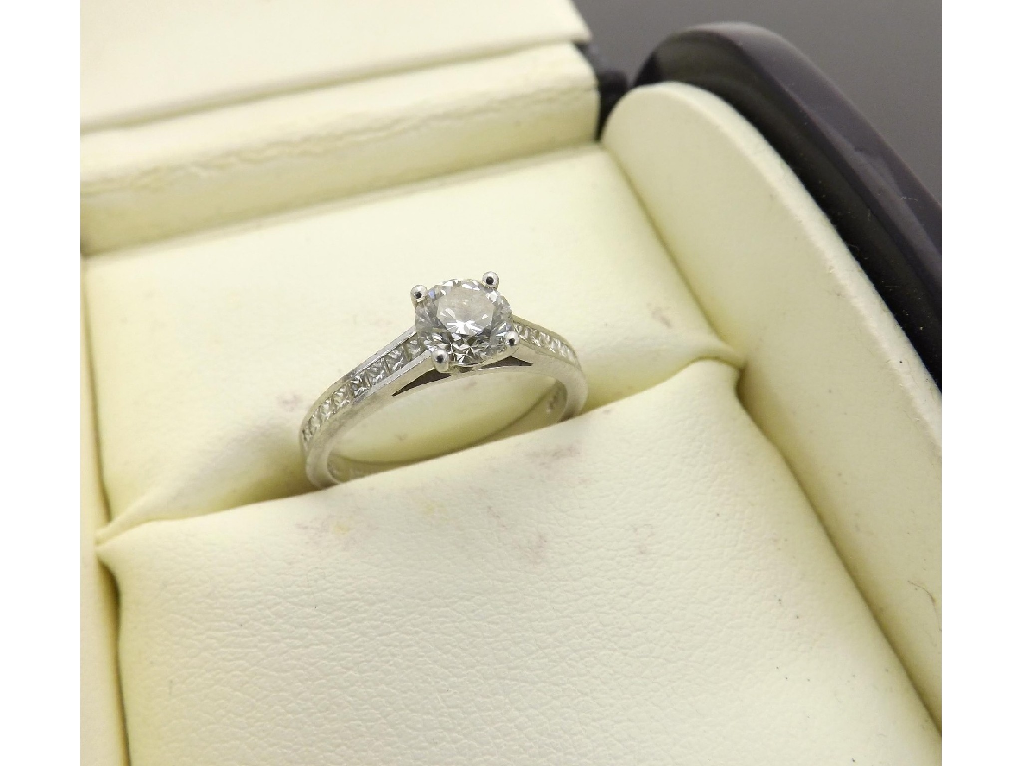 Appraisal: Good quality platinum solitaire diamond ring with princess-cut diamonds to