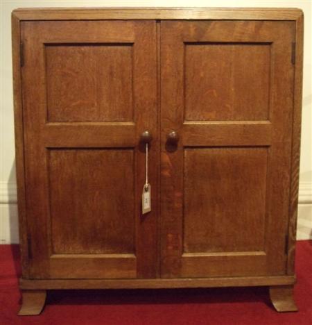 Appraisal: HEAL SONS ATTRIB OAK CABINET CIRCA with twin panelled doors