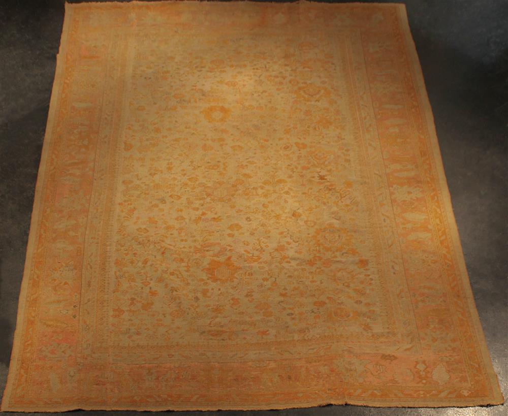 Appraisal: ANTIQUE TURKISH OUSHAK RUG creams and oranges primarily approx '