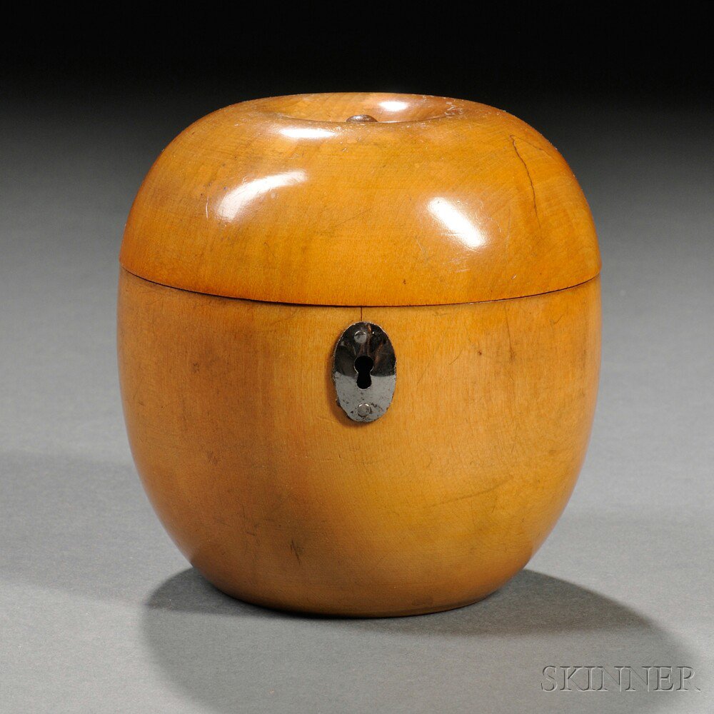 Appraisal: Fruitwood Apple-form Tea Caddy England late th century with oval