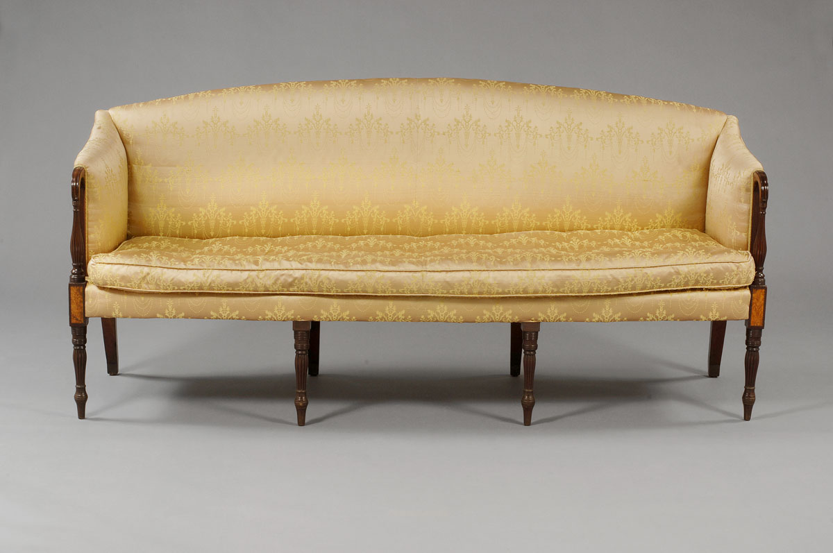 Appraisal: MASSACHUSETTS SHERATON INLAID MAHOGANY SOFA The arched padded back continuing